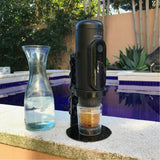 NowPresso Portable Espresso Machine Stand making Iced Coffee with own espresso glass